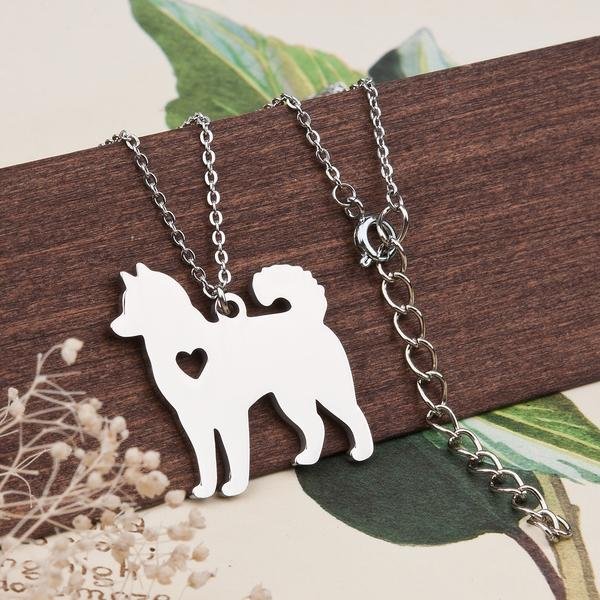 Dog necklace with a heart carved out in the chest area