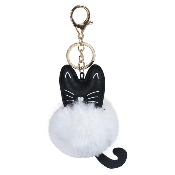 cat keychain with a fluffy white ball as the main body and the head and tail are black